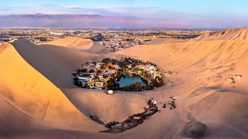 Dune buggy and sandboarding at the Huacachina oasis on a Ballestas Islands tour from Paracas, Peru